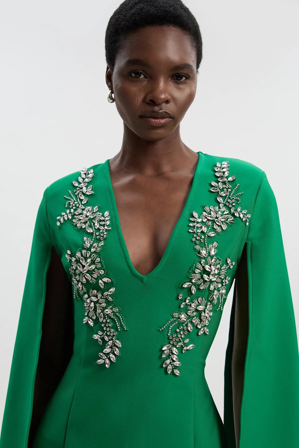 Bandage Form Fitting Cape Sleeve Embellished Mini Dress