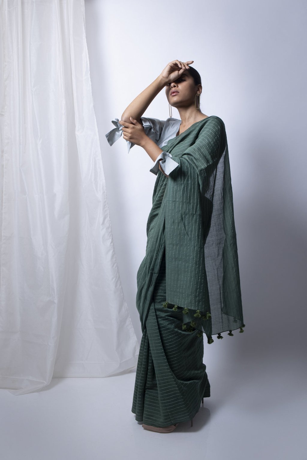 Forest Green Saree with Silver Blouse